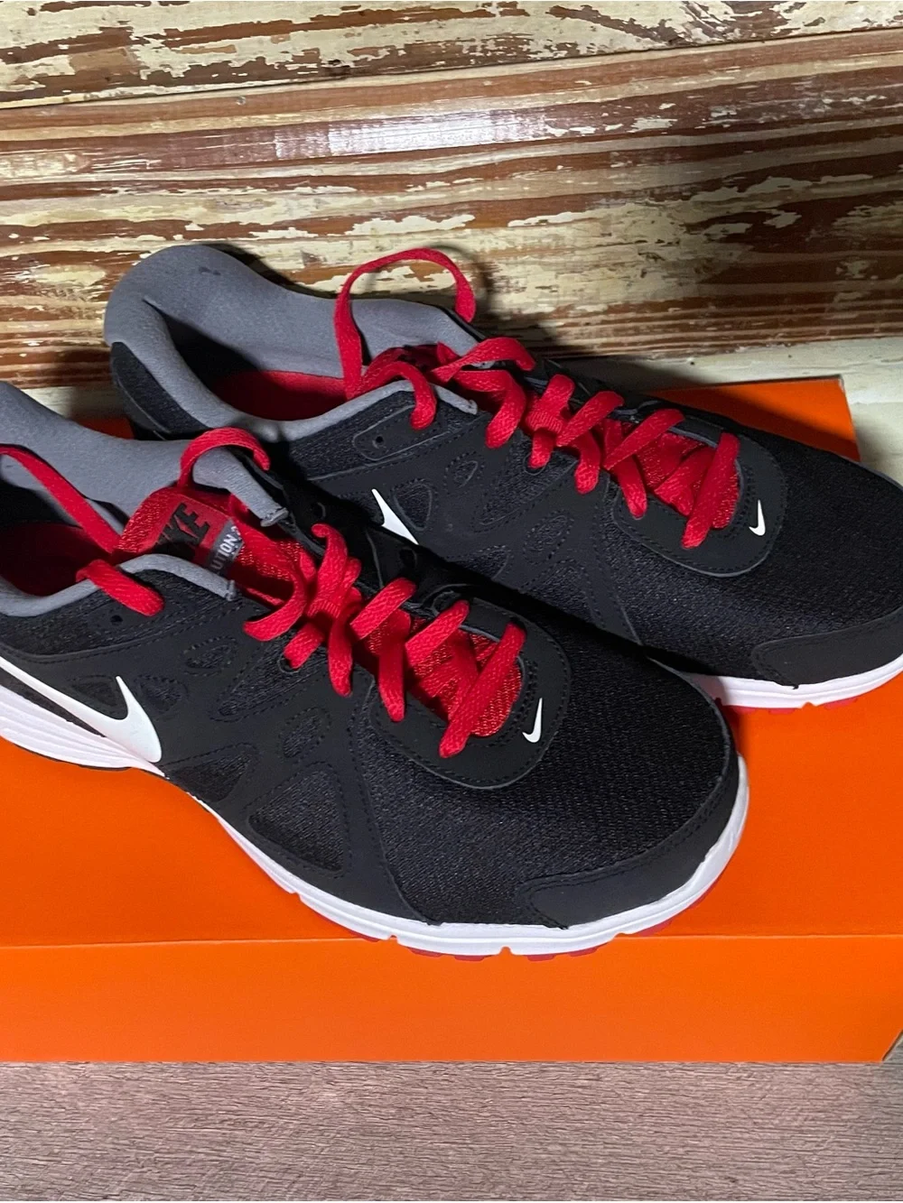 Nike Black Sneakers with Red Laces and White Swoosh - Picture 1 of 4